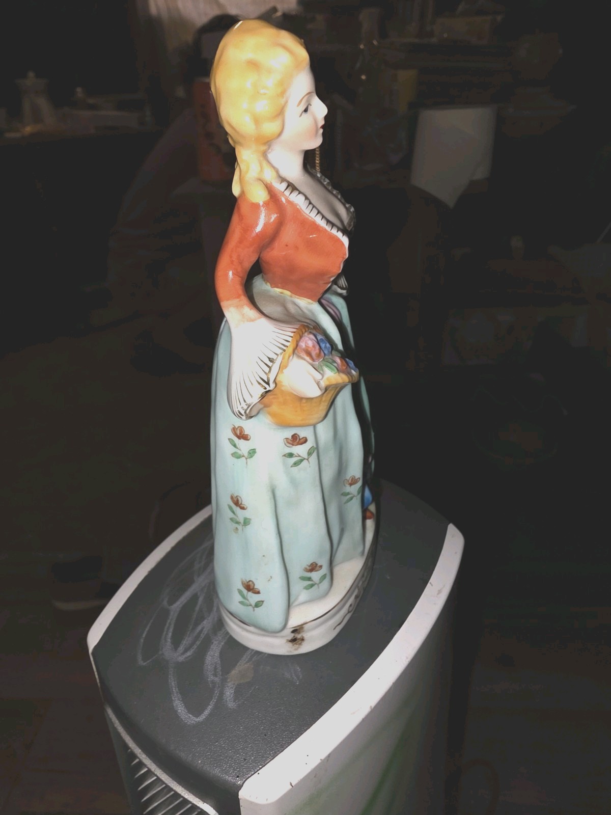Old Porcelain Figurine