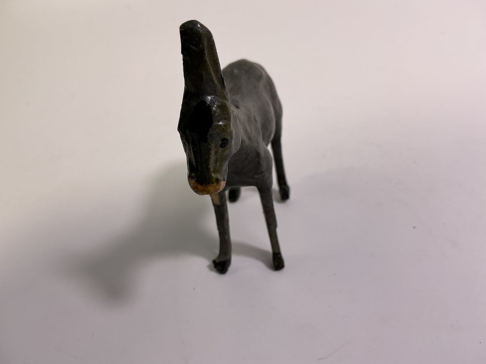 Heavy Metal England Steer Marked Putz Donkey 1930s Composite Wood