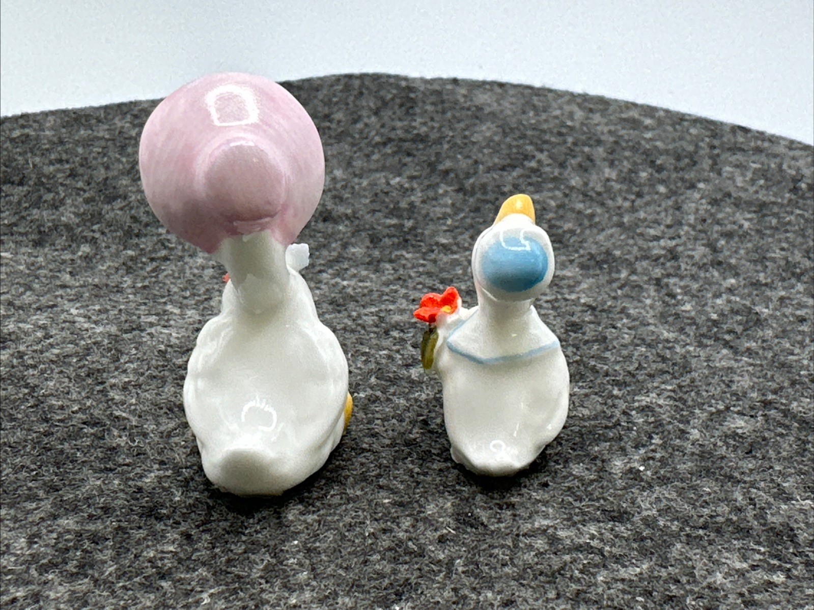 VTG Mother Goose And Baby Boy Mini Porcelain Figurines Holding Flowers