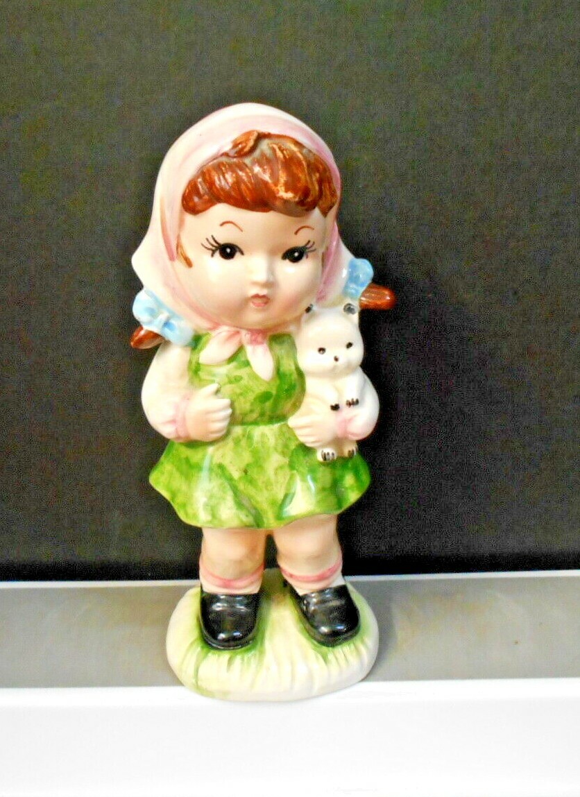 NORLEANS JAPAIN CERMAIC FIGURINE GIRL HOLDING PET 7 1/2″ TALL PRE-OWNED