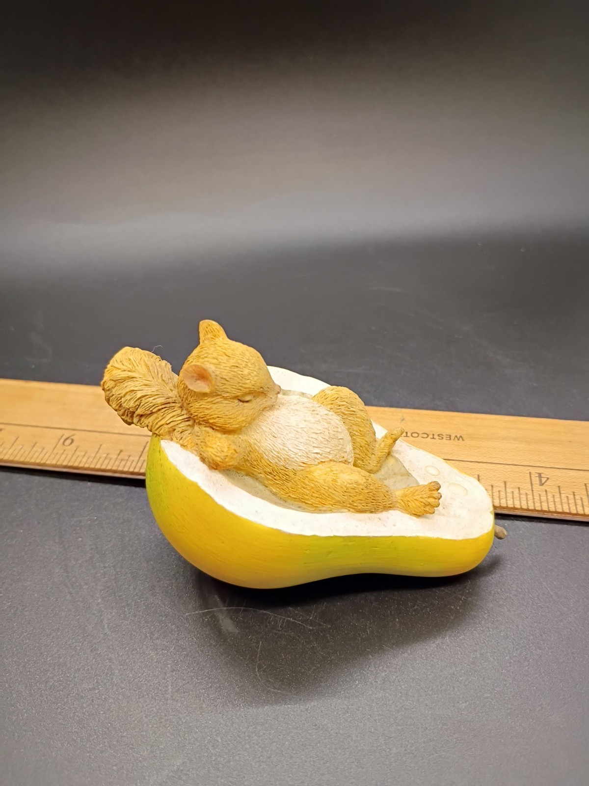 Squirrel Sleeping In Half A Pear Figurine 3.5*Long By 1.75″ Wide By 2″ Tall