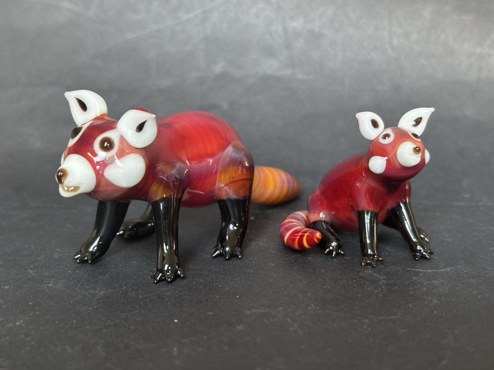 Suellen Fowler Two Glass Red Panda Figurines