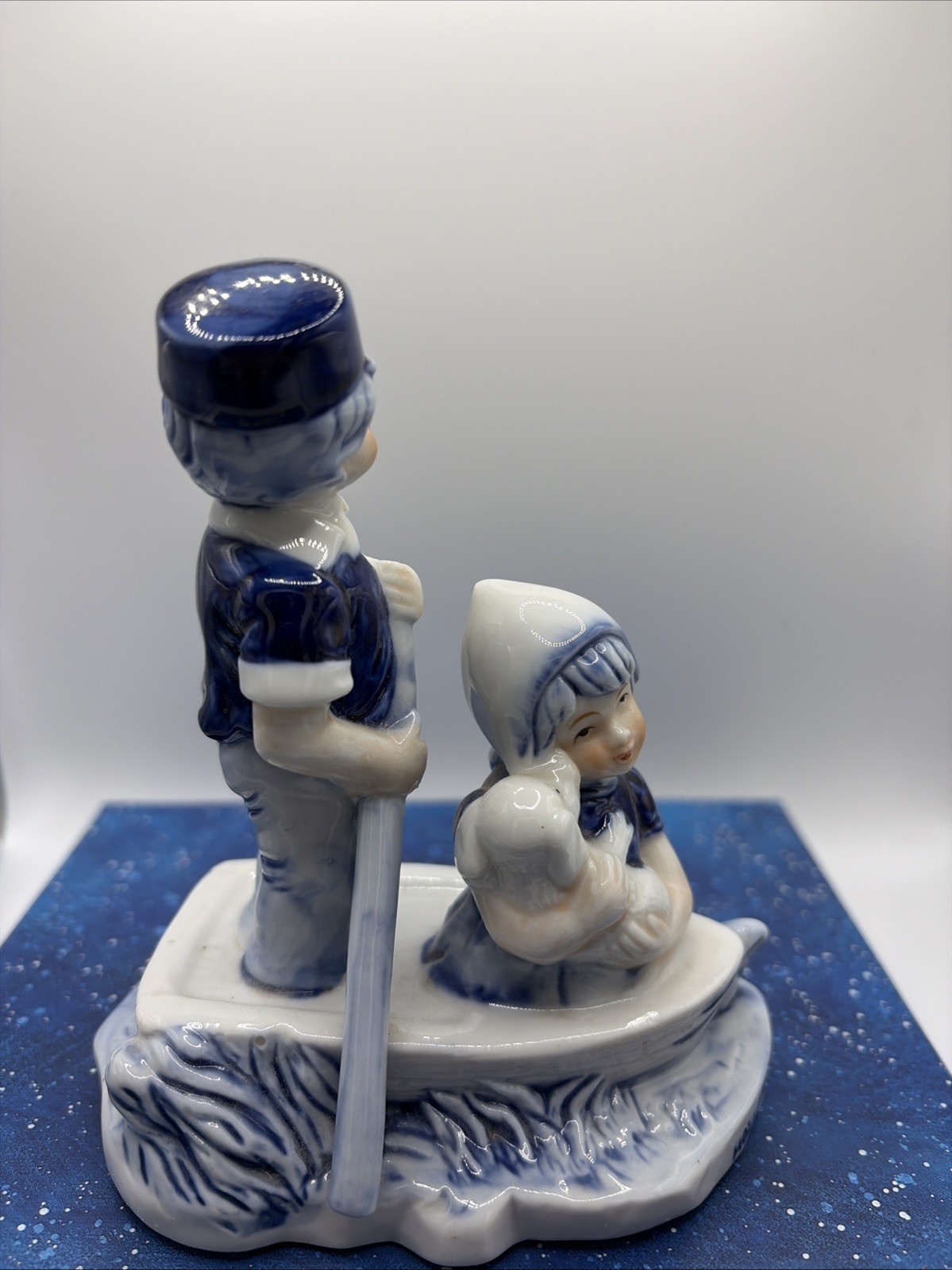 “Dutch Boy Rowing, Girl & Pup: Vintage Holland Souvenir Figurine”