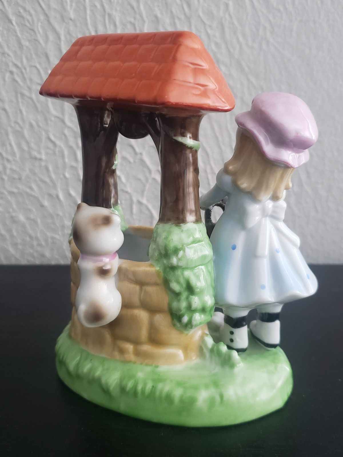 Vintage girl with cat at wishing well hand painted figurine made in Korea