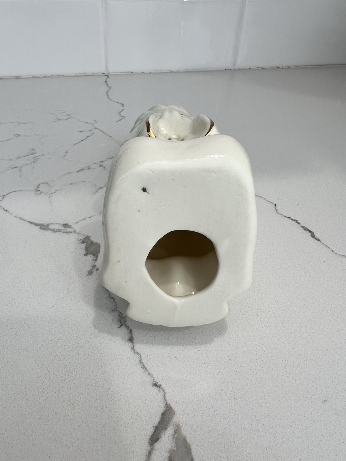 Praying And Kneeling Angel White Ceramic With Gold Accents.