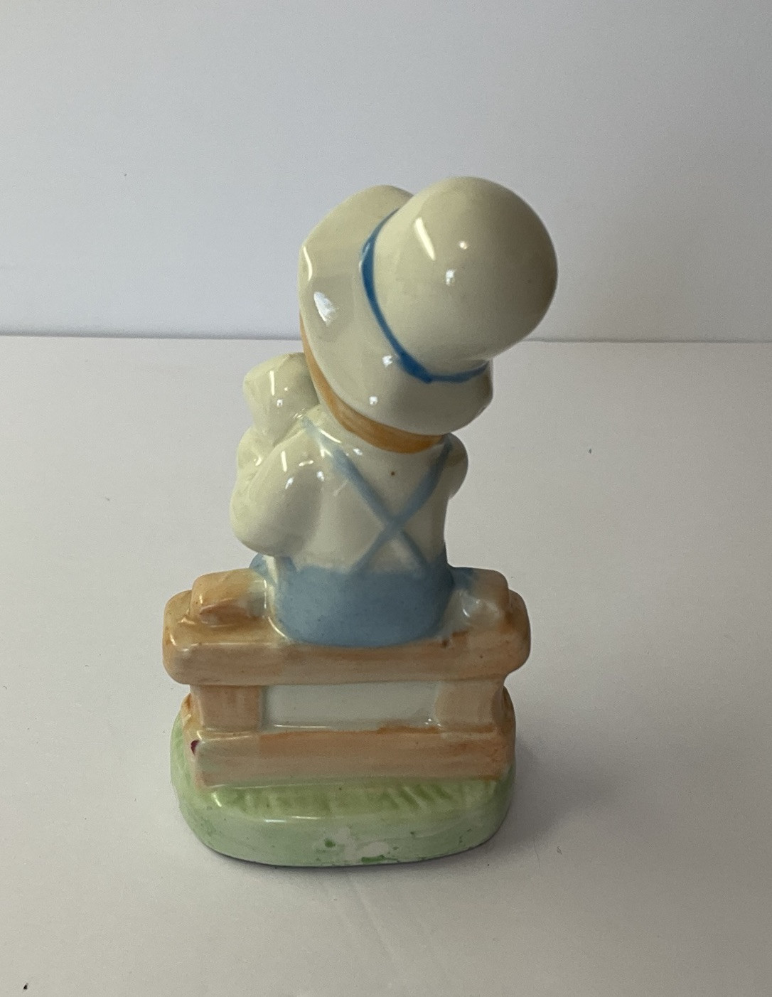 Vintage Boy Figurine in Overalls Holding Lamb Sitting on Fence 4.50” Tall