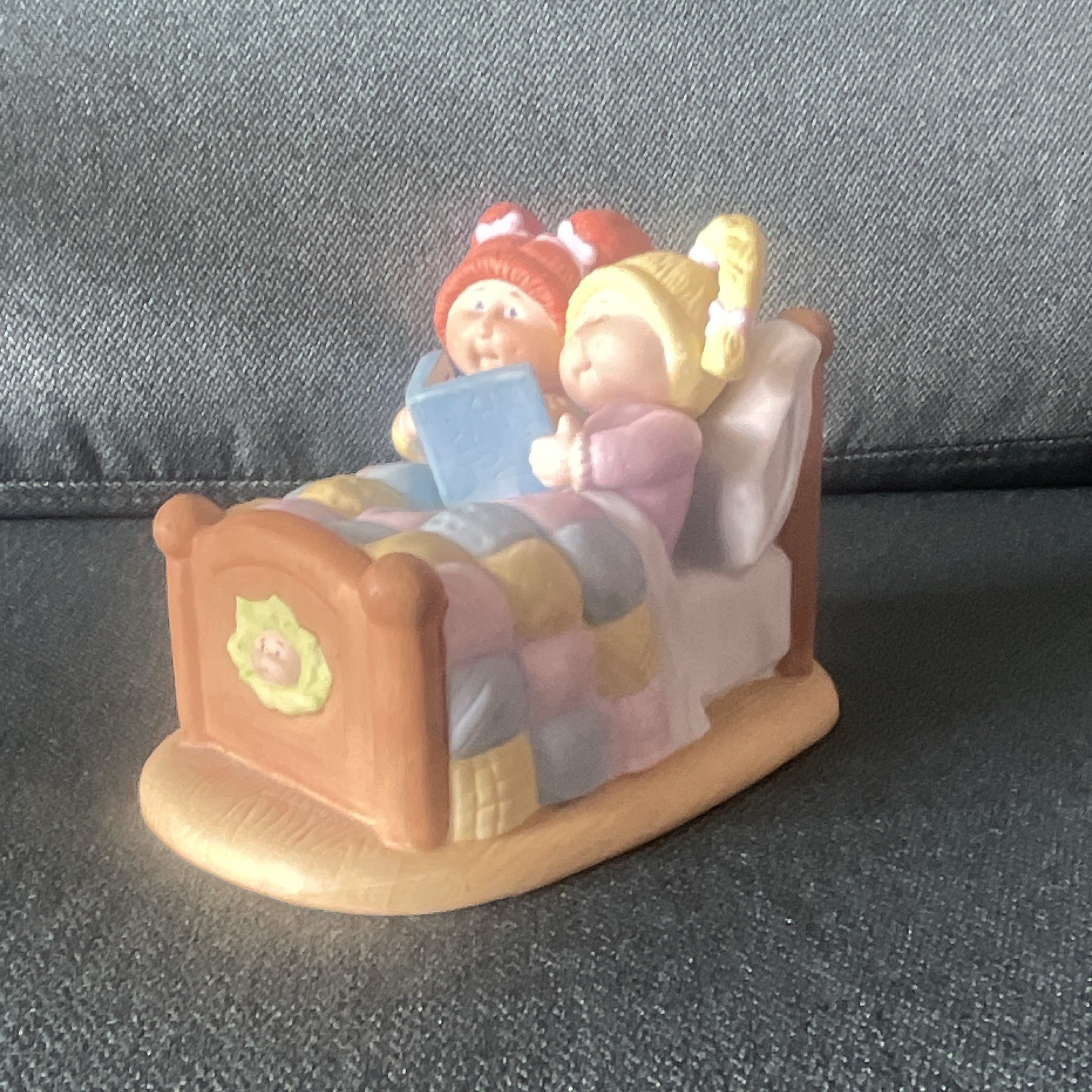 Ceramic Painted Multicolor Figurine Two Children Reading in Bed Patchwork Quilt
