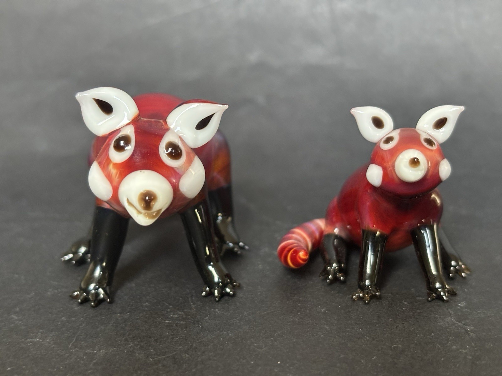 Suellen Fowler Two Glass Red Panda Figurines