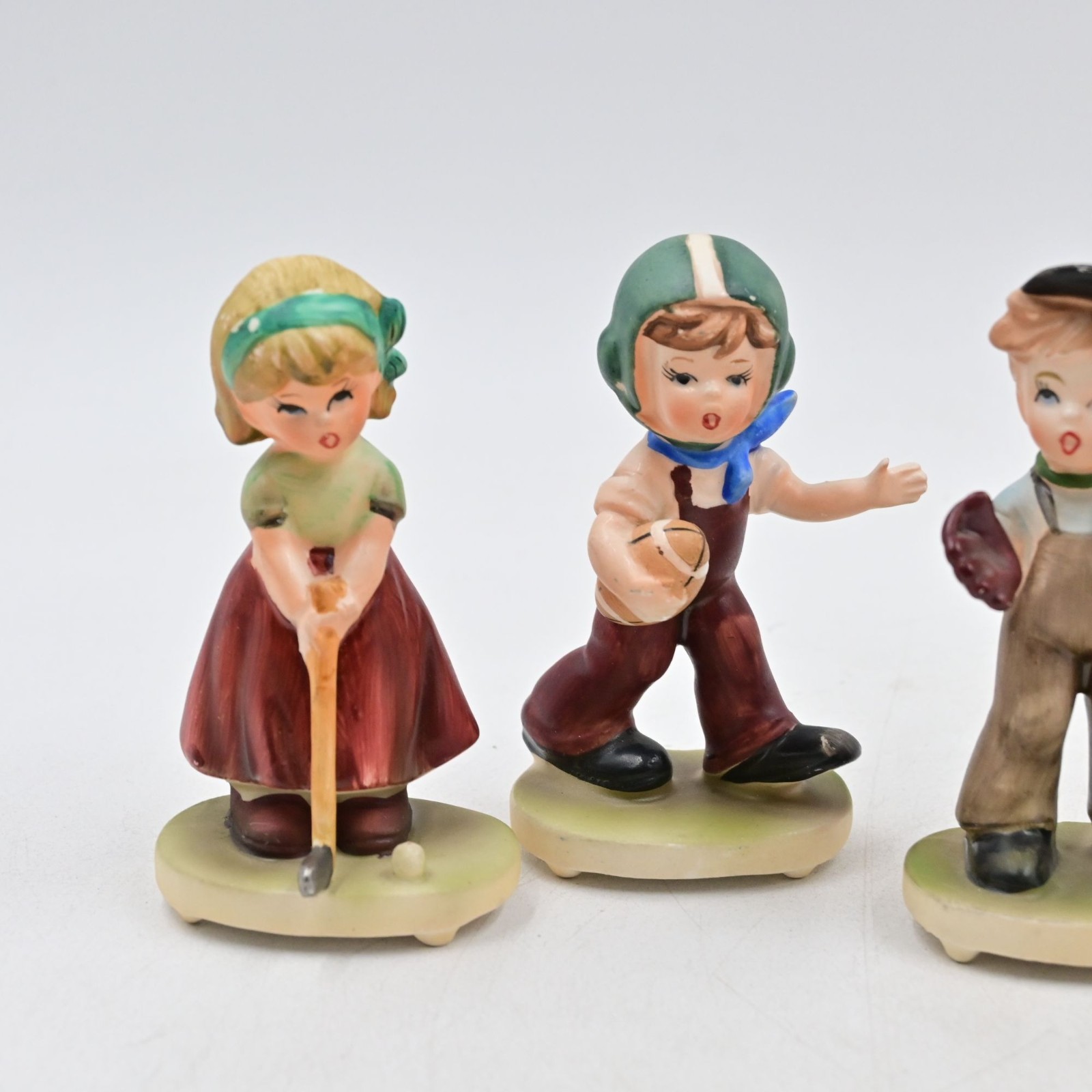 Napcoware Sports Figurines Football, Golf, Baseball Bundle Of 4