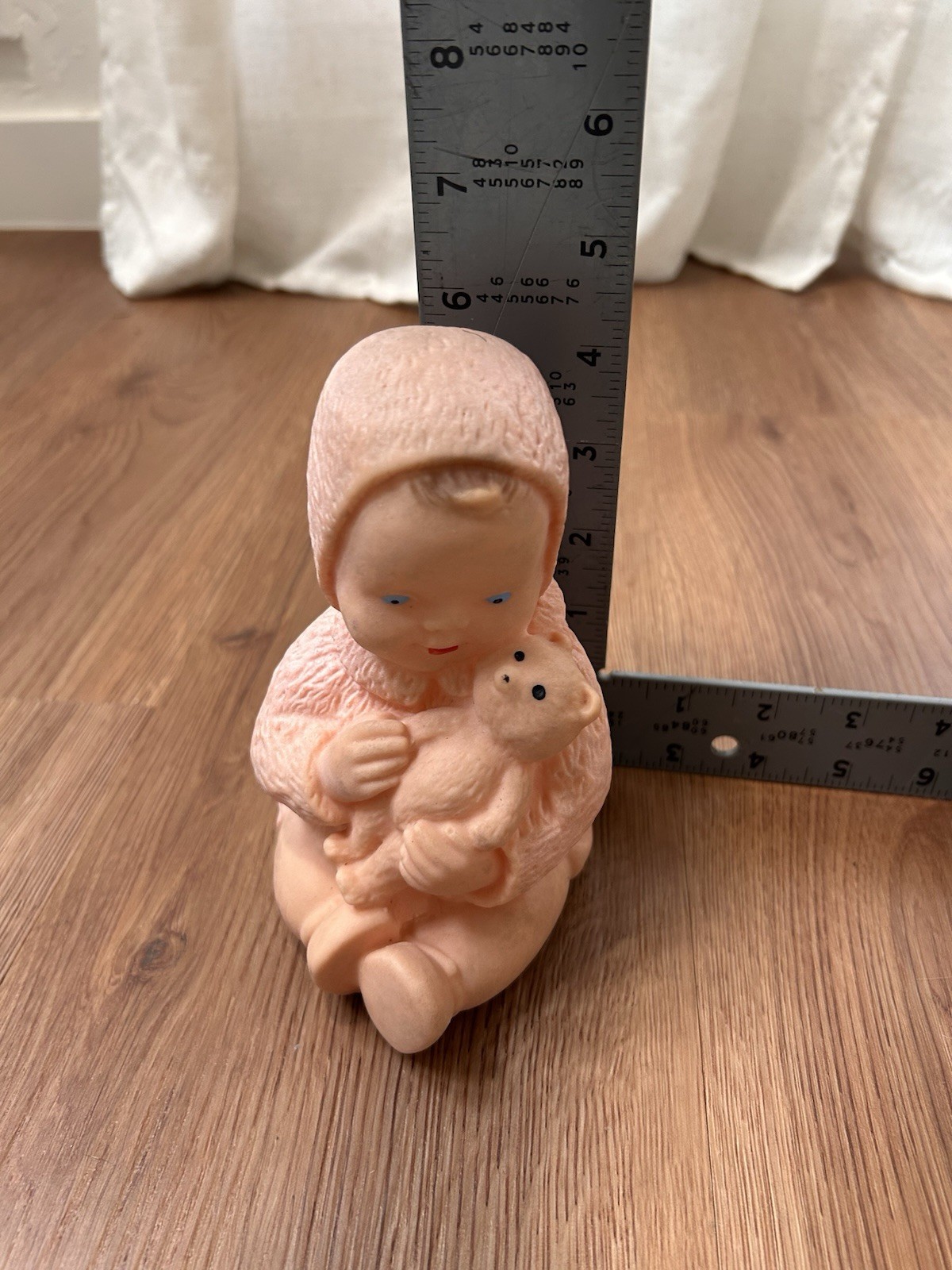 Mid 20th century model molded rubber baby figurine with teddy bear 6” height
