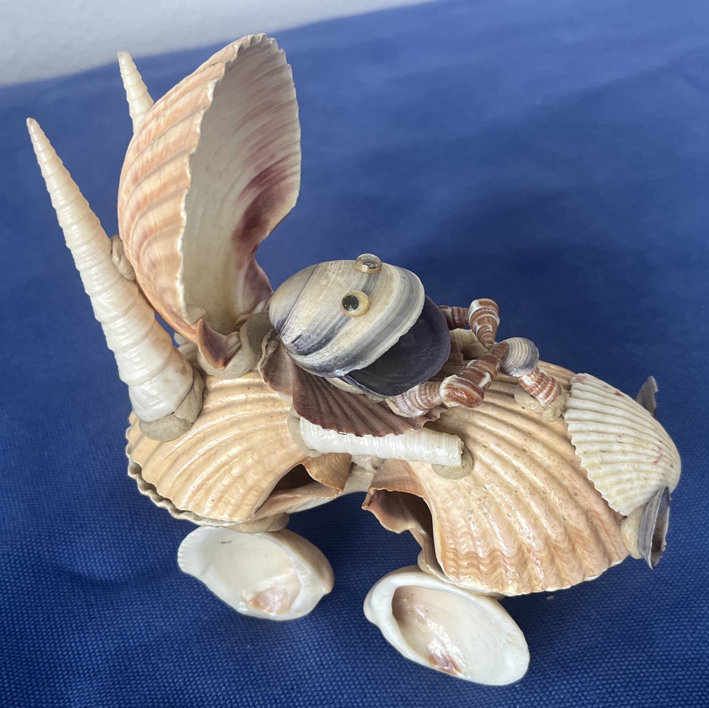 Vintage Handcrafted Figurine Riding a Vehicle made out of Seashells