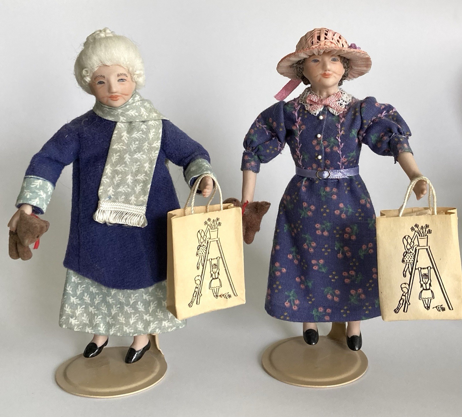 Porcelain Old Women Pair by Lauren – Custom-made for Bea Skydell w/Shopping Bags