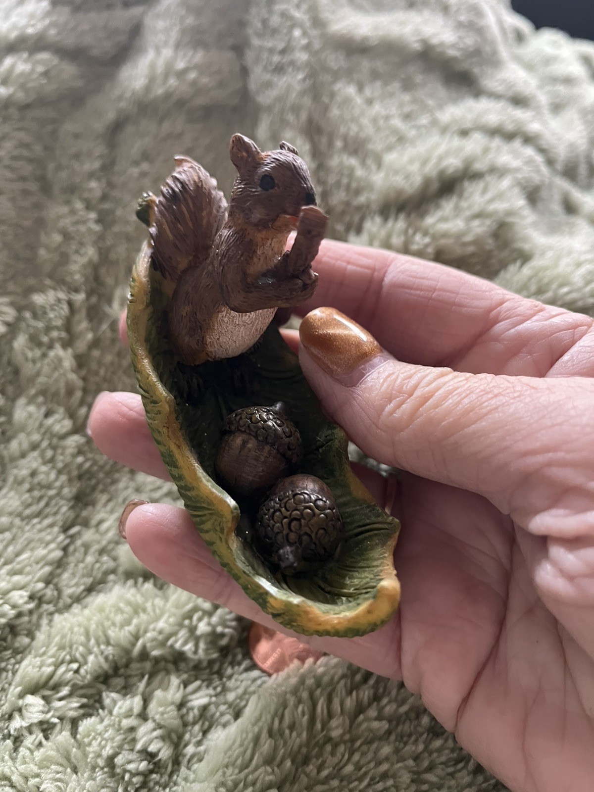 Adorable Whimsical Squirrel Rowing A Leaf Boat Figurine