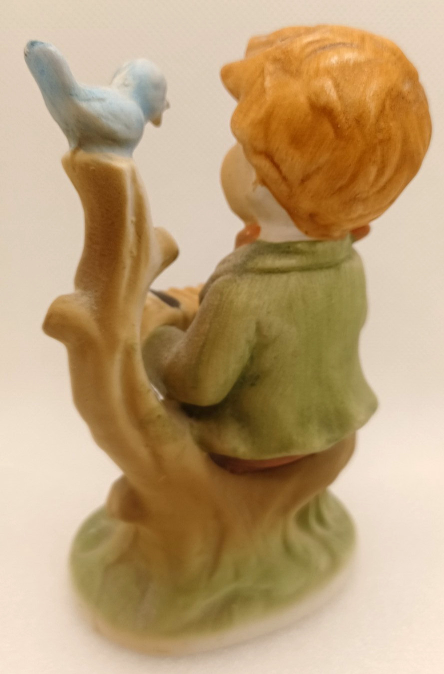 VTG YOUNG BOY PLAYING AN ACCORDIAN TO A BLUE BIRD ON A BRANCH-4 3/4″ TALL