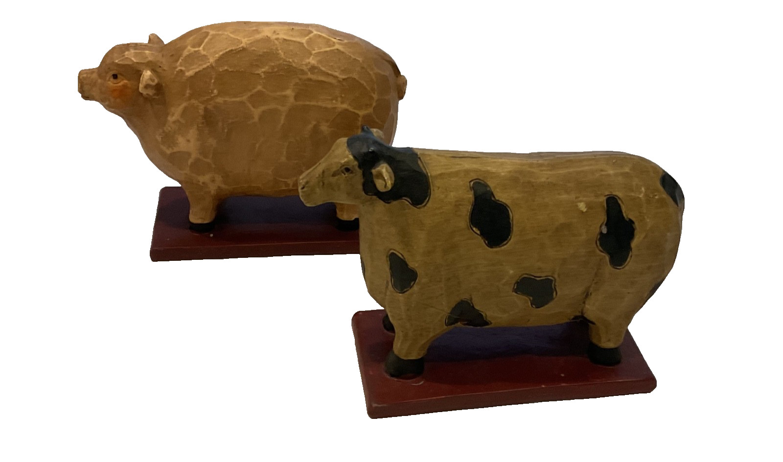 Vintage Hand Carved Folk Art Cow and Pig Sculpture On Red Stands