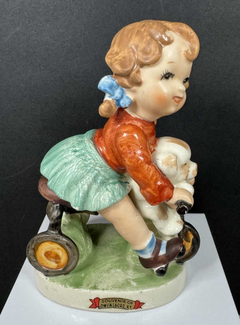 Vintage Small Girl Riding Trike with Puppy Souvenir of Owensboro, KY Figurine
