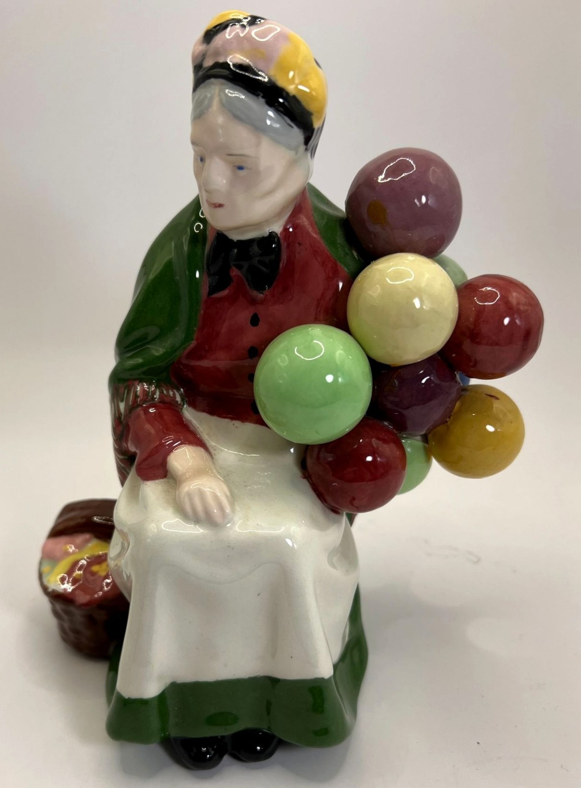 Porcelain Woman Selling Balloons Figurine Hand-Painted Multicolor Vintage Collec