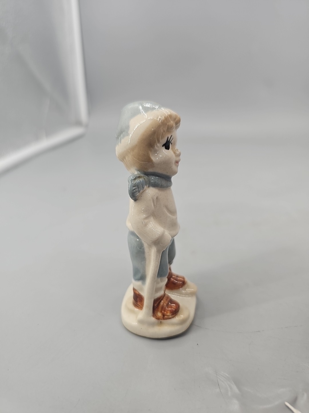 Vintage Ceramic Porcelain Skiing Boy Figurine Winter Snowshoes
