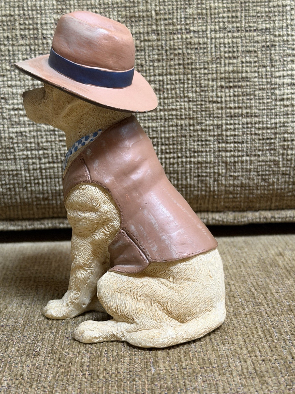 lifelike dog figurine in clothes