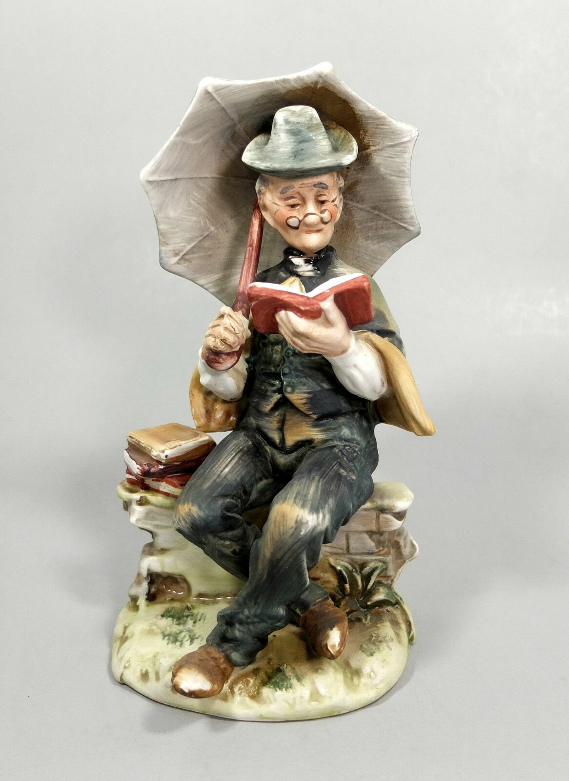 Vintage NORLEANS OLD MAN READING BOOK w/Umbrella Bisque Porcelain Figurine