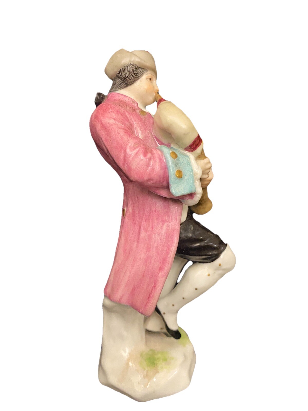 SAMSON PORCELAIN FIGURINE OF LAD PLAYING BAGPIPES
