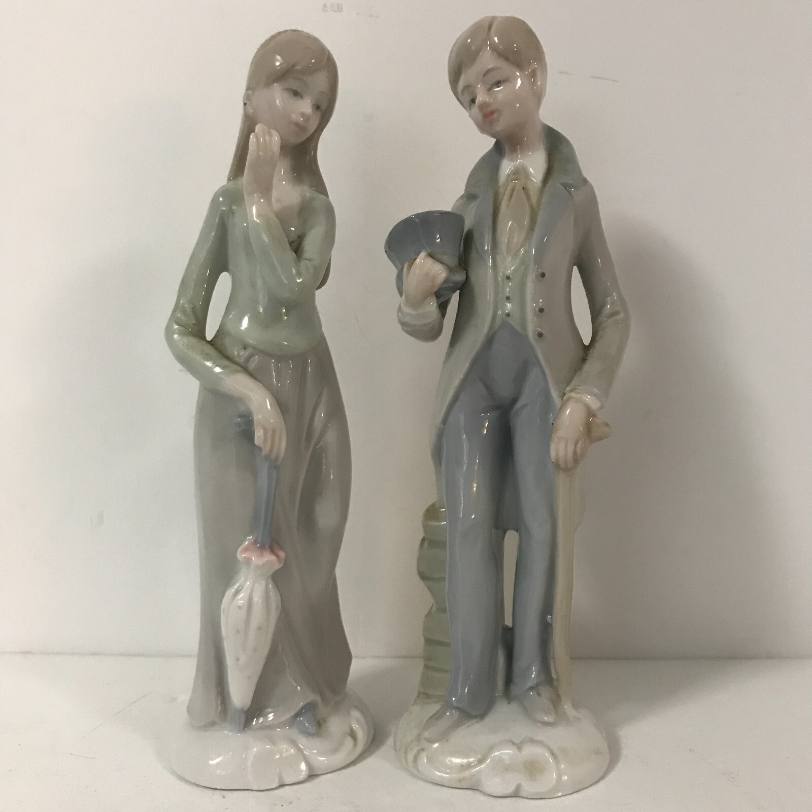 Man and Woman Porcelain Figurines Pastel Lladro-like Colors Shiny 8″ No Label
