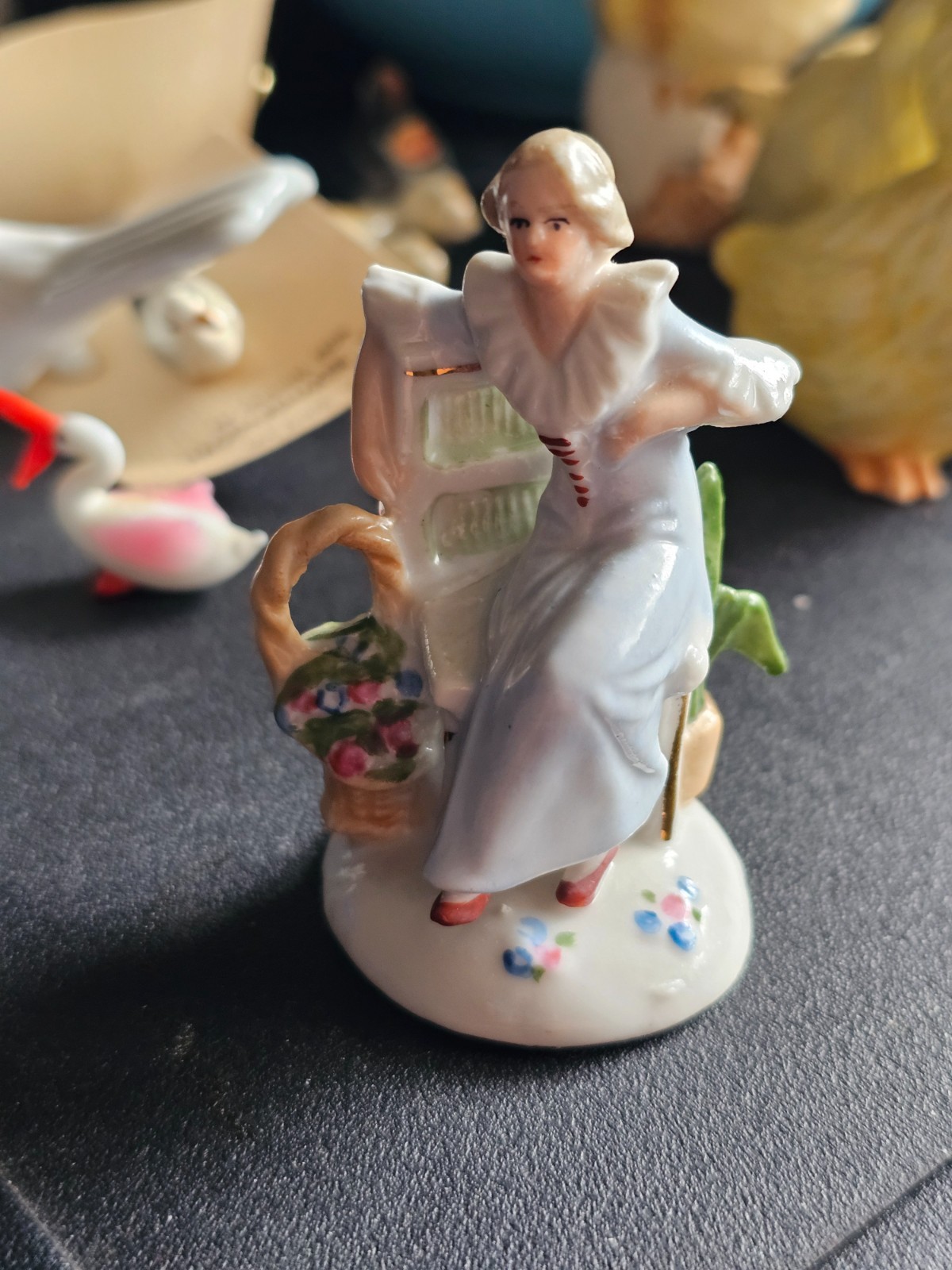 Vintage Porcelain Figurine with Woman and Flowers