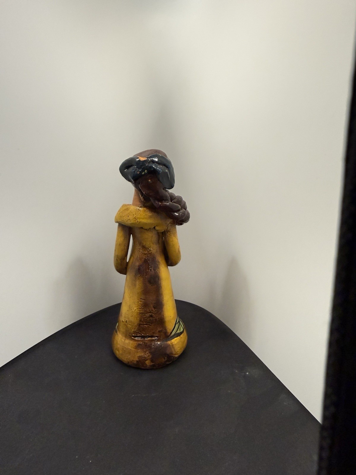 Faceless woman in handcrafted ceramic from Hawaii