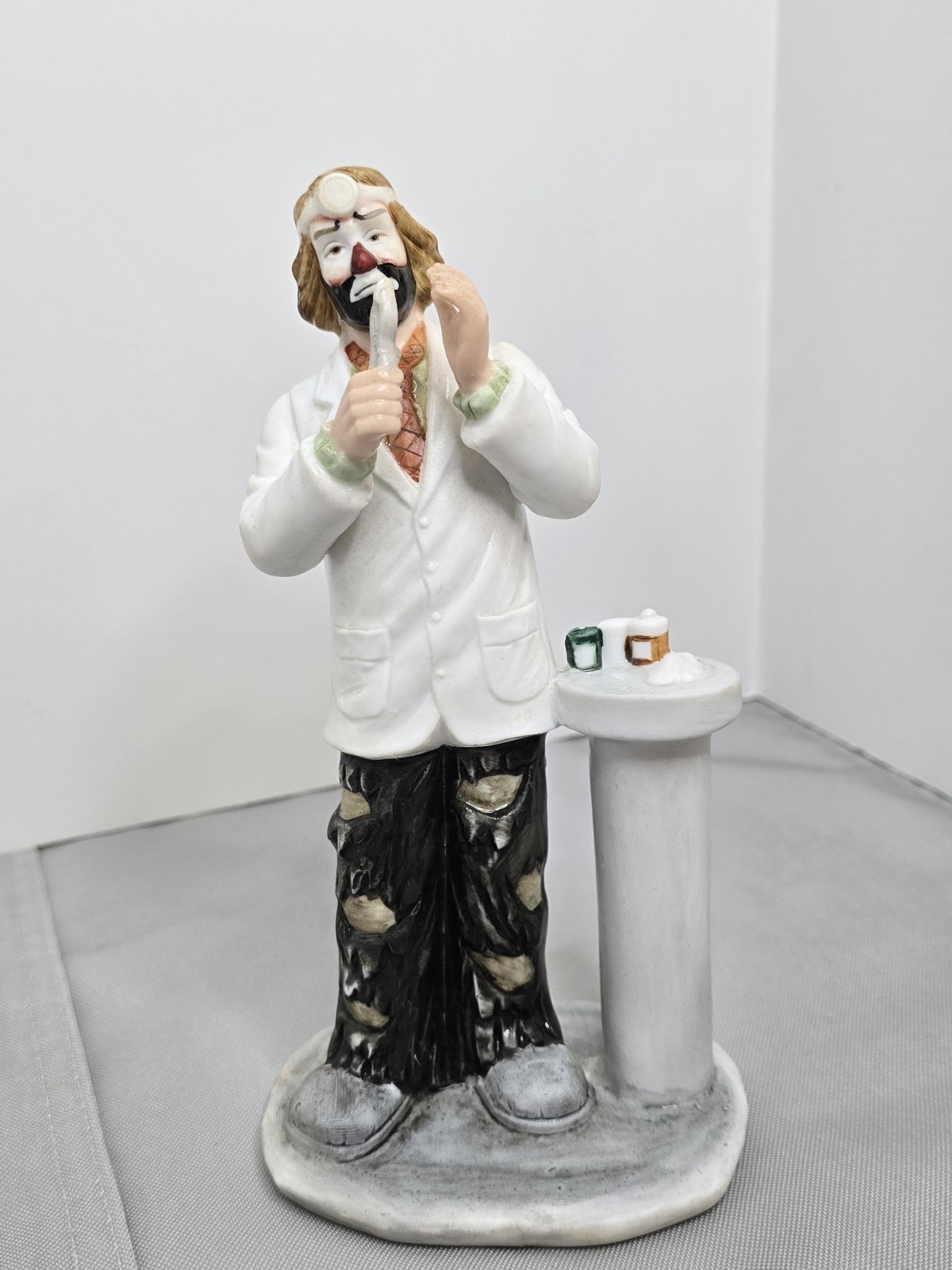 Emmett Kelly Jr. Collection produced by Flambro, depicting a clown as a dentist.