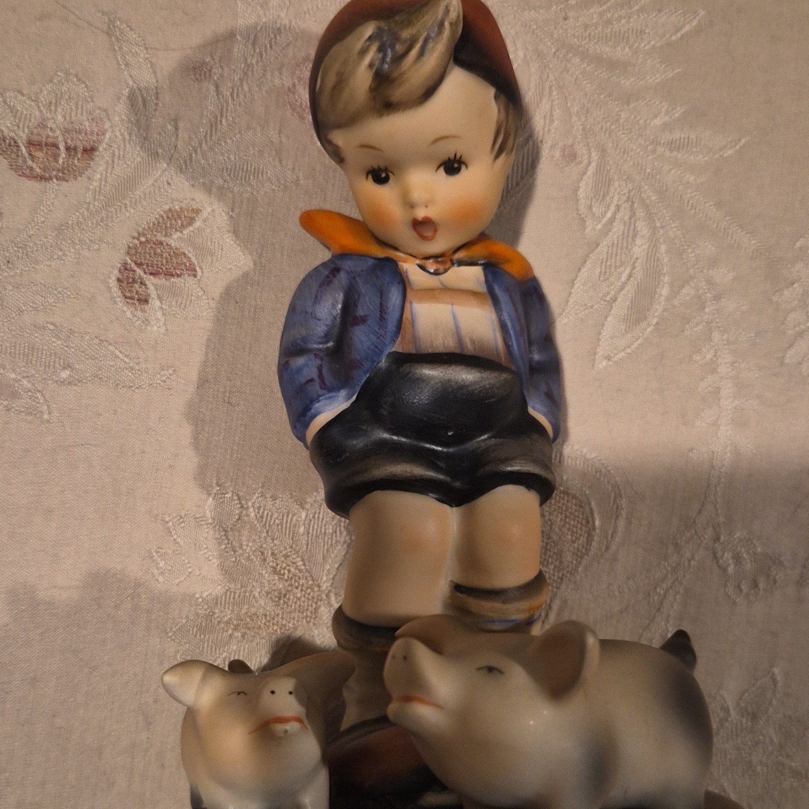 Hummel Goebel Piglets & Boy Wearing Red Cap and his Father’s Slippers W. Germany