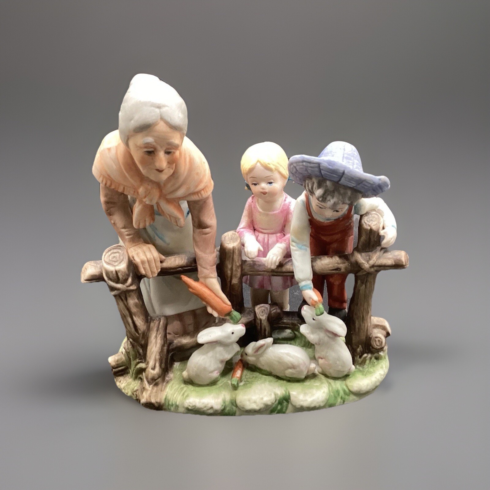 Vtg Lady and Kids Feeding Rabbits Figurine 6″ x 6″ As Is Ceramic Korea Decor