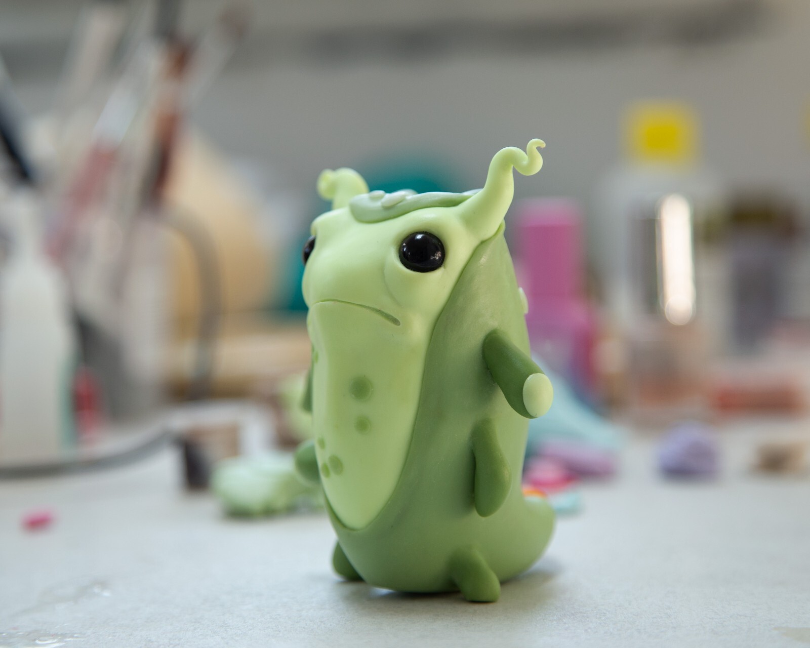 Cool and weird Germ Microbe figurine in anime style, polymer clay creature doll