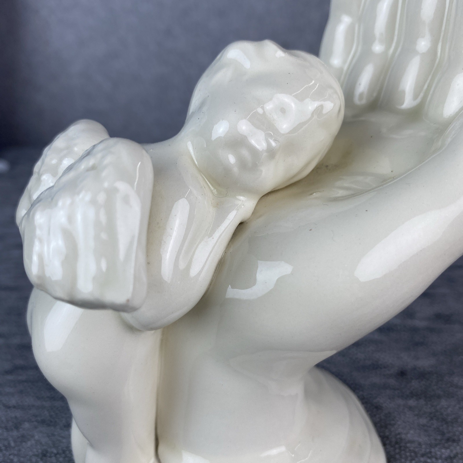 Ceramic Sleeping Cherub On The Hand of God Angel White Shiny Glaze