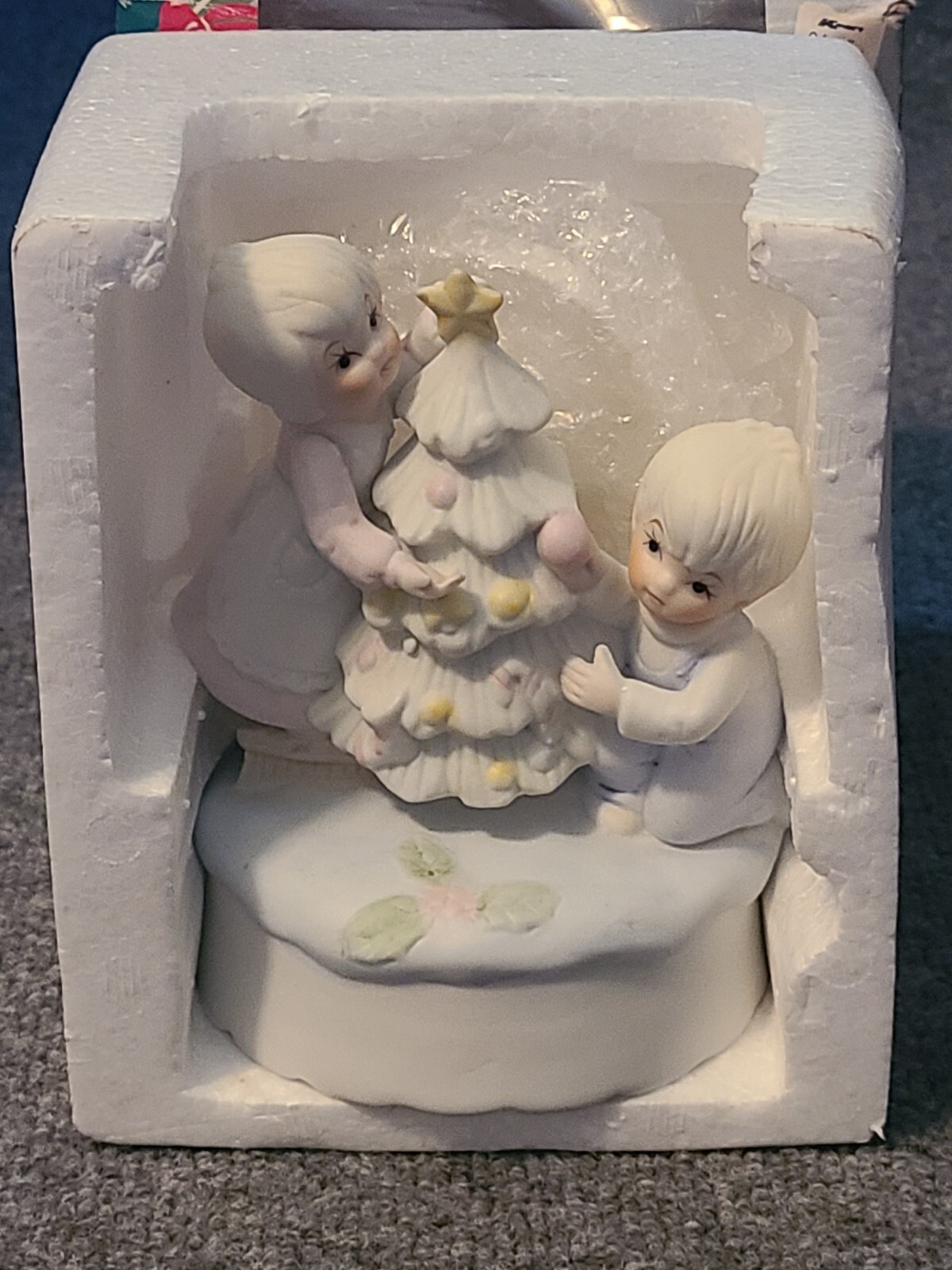 Musical Porcelain Figurine Plays Silent Night Melody