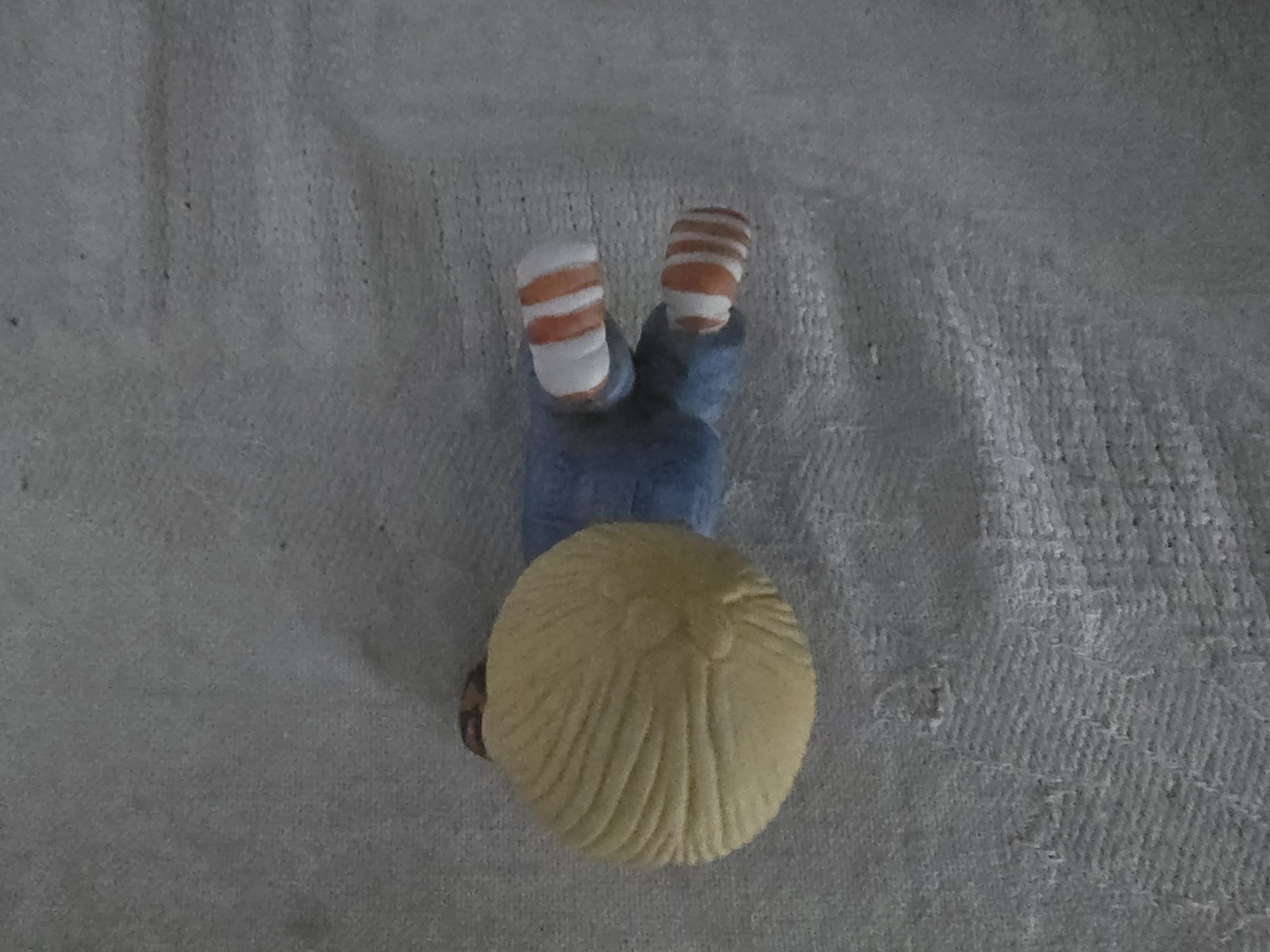 EnescoCountry Cousins Scooter Laying On Floor Figurine