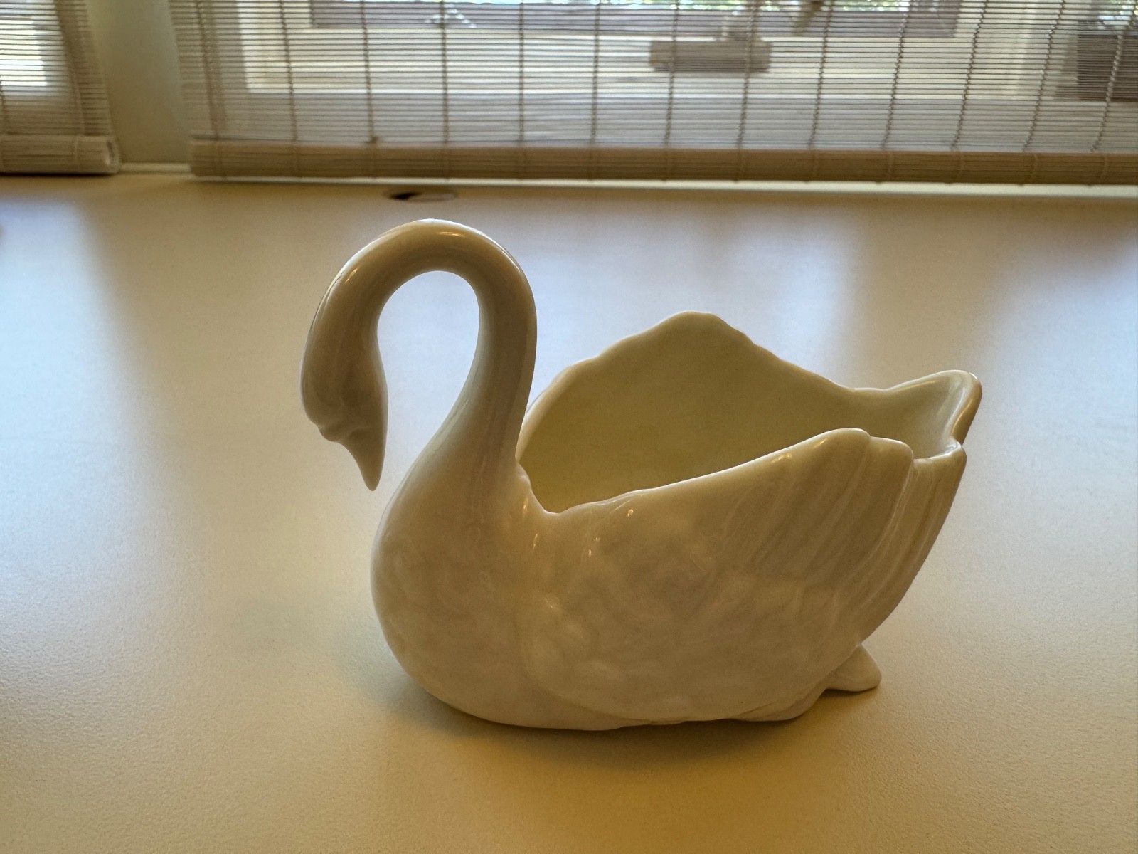 Lenox porcelain trio of animal figurines Elephant gold trim and 2 swans.