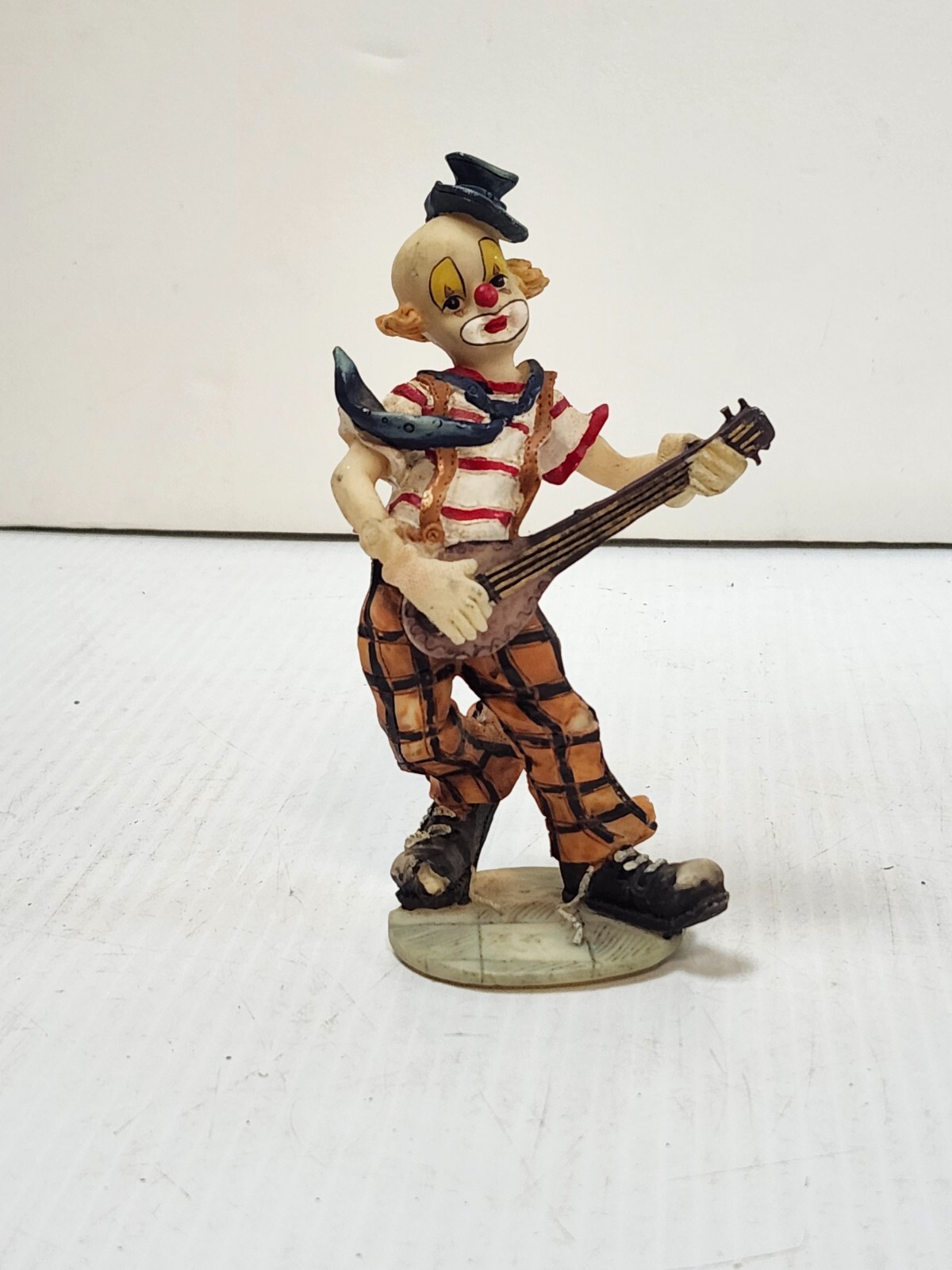 Vintage Clown Musician Figurine playing a Mandolin 5 1/2 Inches tall
