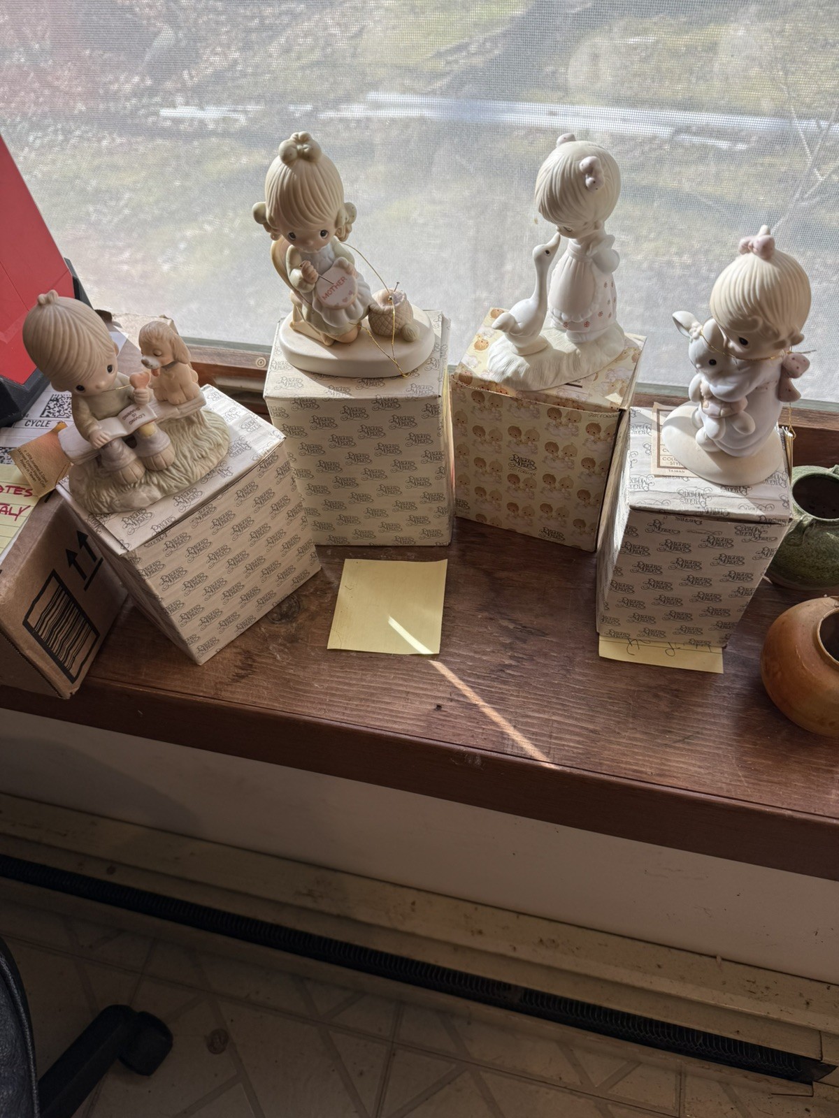 Precious Moments Figurines set of 4. 2 FROM 1978 2 FROM 1979
