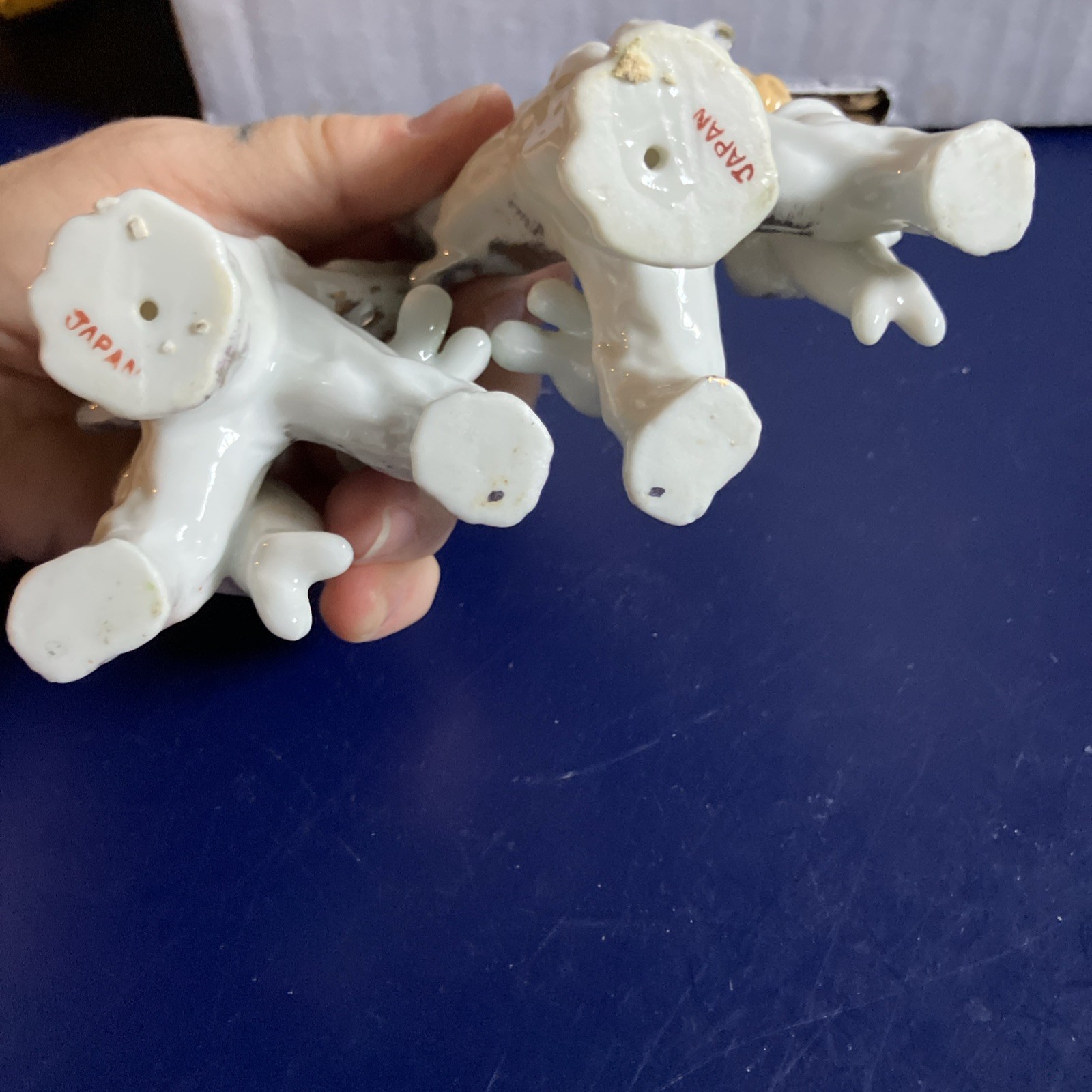 Two Vintage Cherubs Playing Instruments