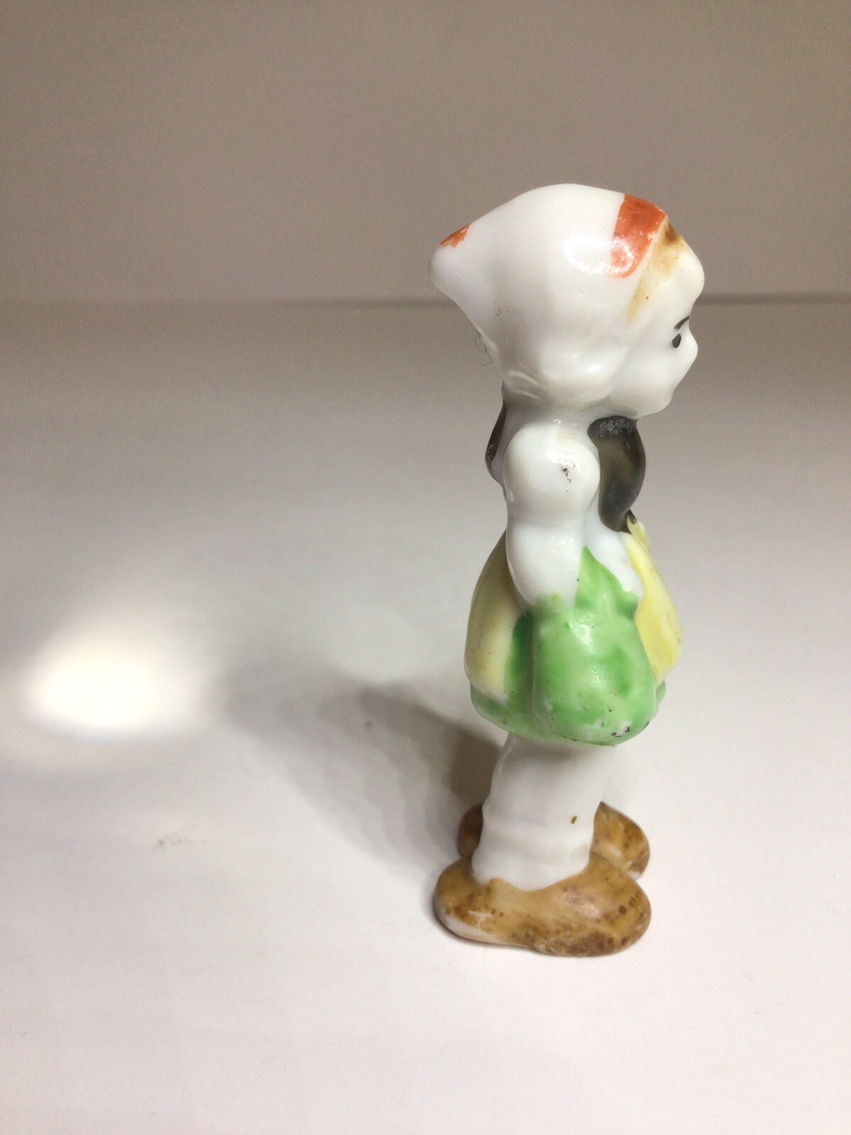 Miniature Made In Japan Girl Wearing Bonnet Holding Bag Figurine 2 3/8 Inch Vtg