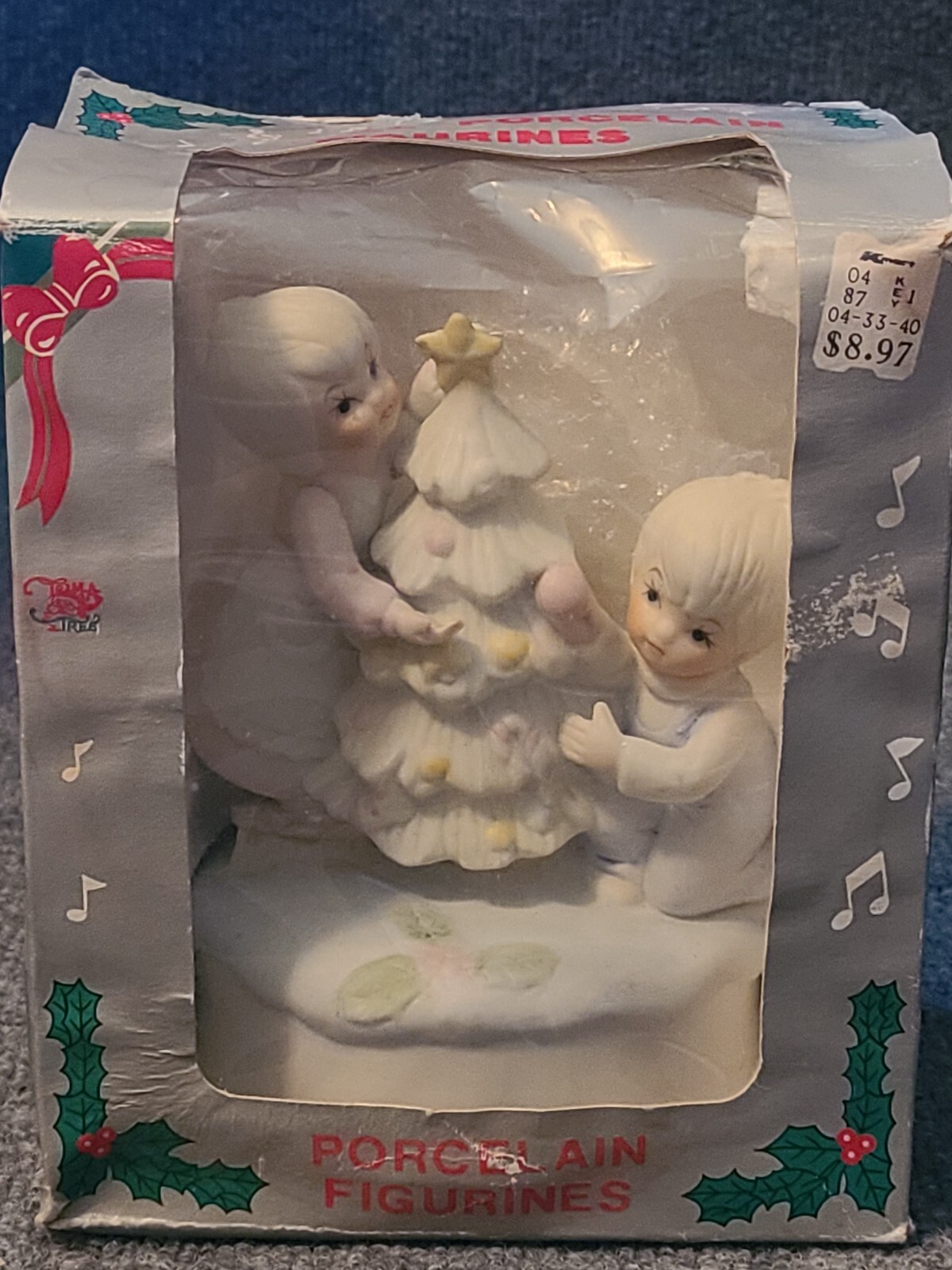 Musical Porcelain Figurine Plays Silent Night Melody