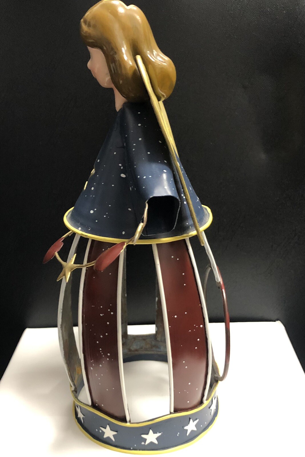 10” angle figurine. metal body ceramic head