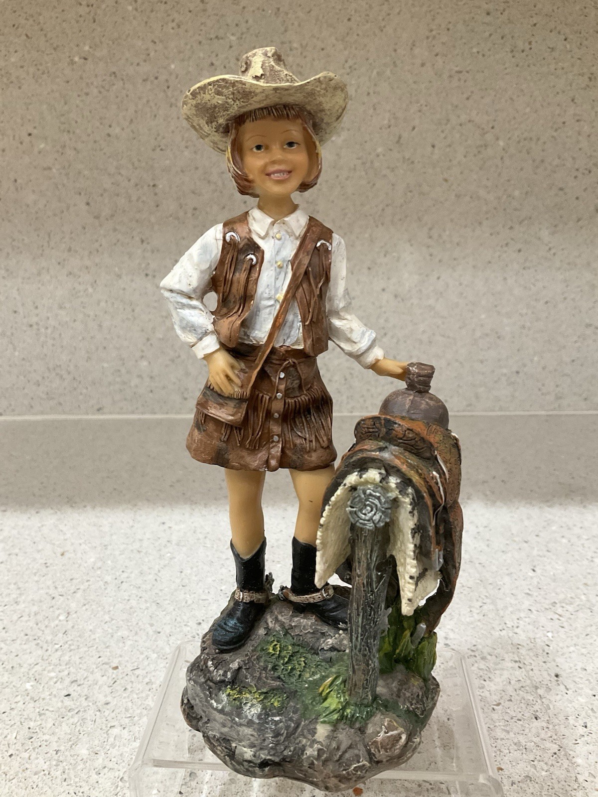 Vintage Cowgirl Figurine Resin Child Cowboy Hat Boots Saddle On Fence Post 5.5″