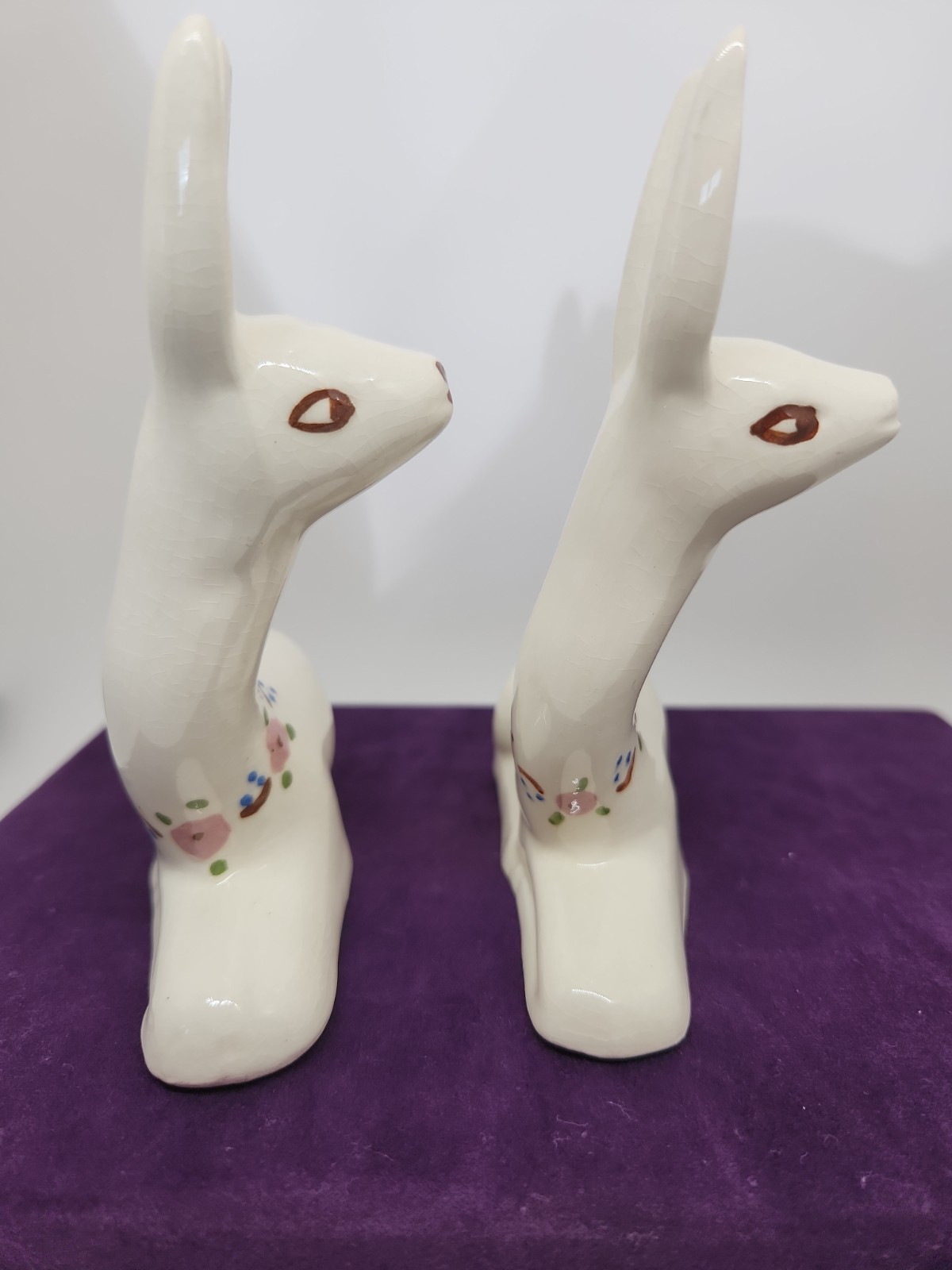 Vintage ceramic deer figurine with painted floral accents. “T” & “W” Marking.