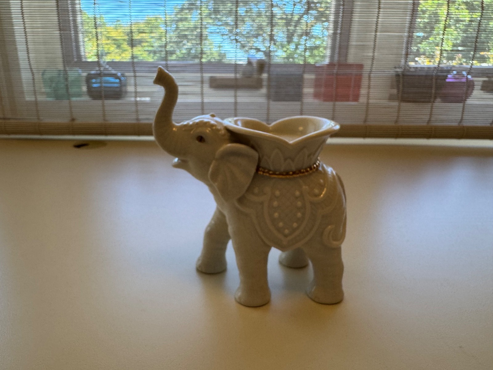 Lenox porcelain trio of animal figurines Elephant gold trim and 2 swans.