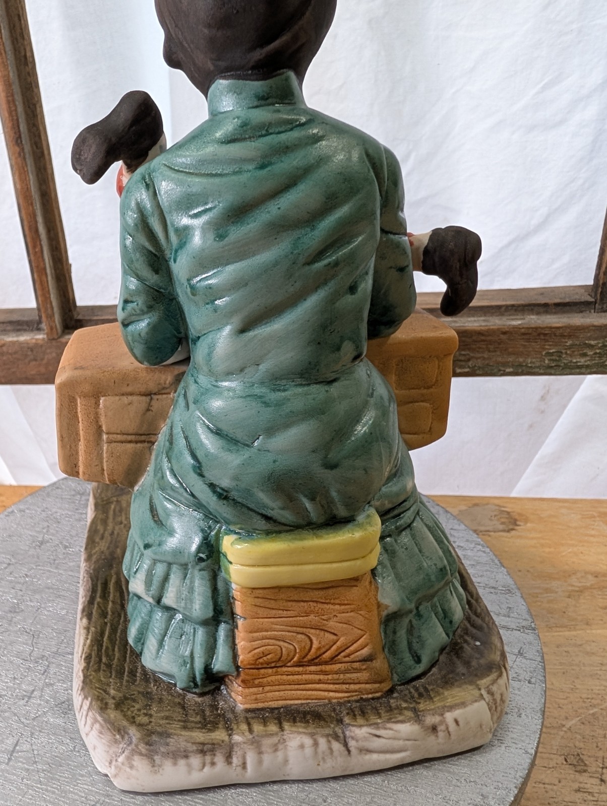 CERAMIC GRANDMA SEWING YOUNG BOY’S PANTS
