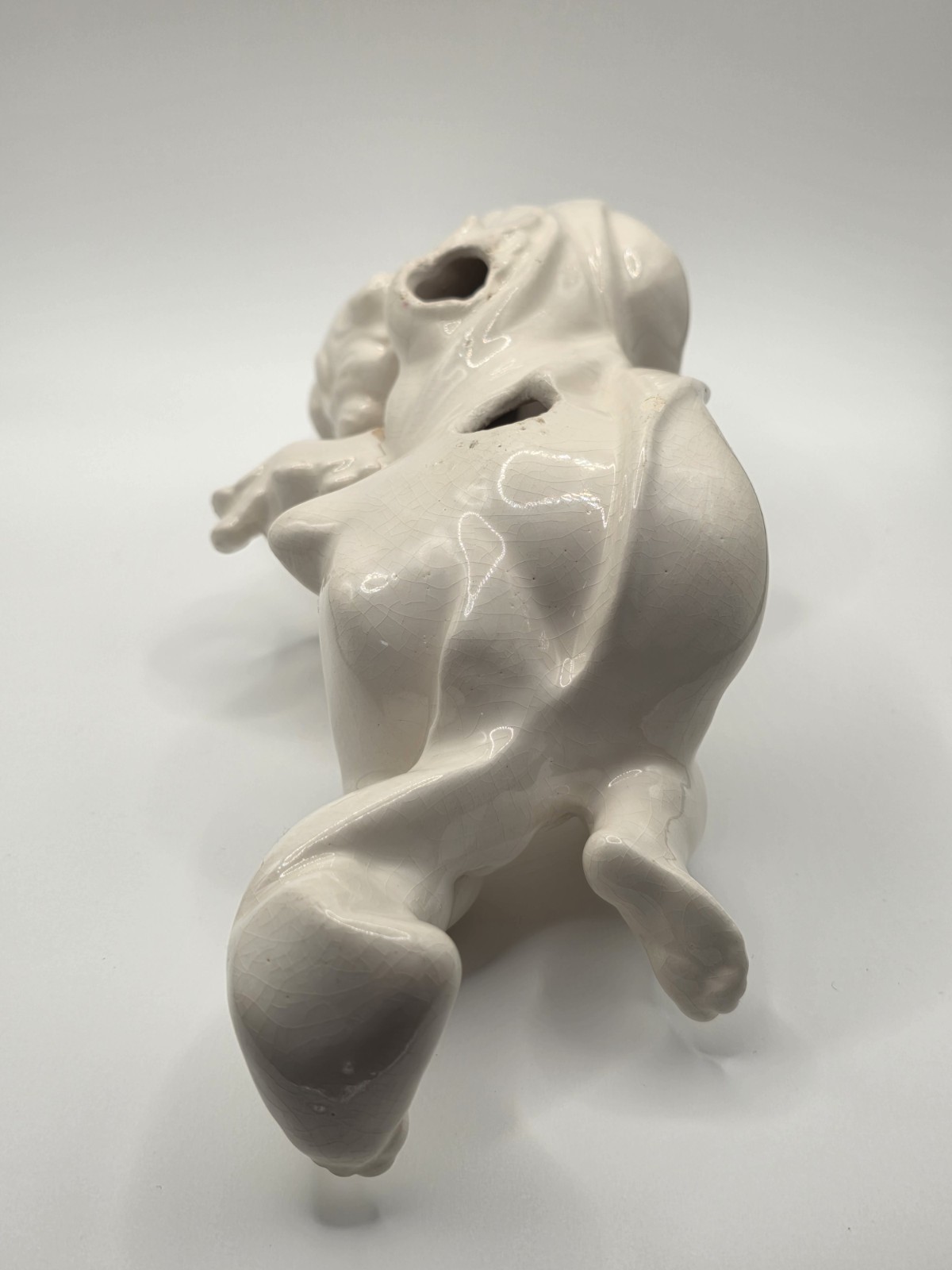 Vintage Ceramic Cherub Angel Figurine Reclining on Scroll Base – Cracks/Read