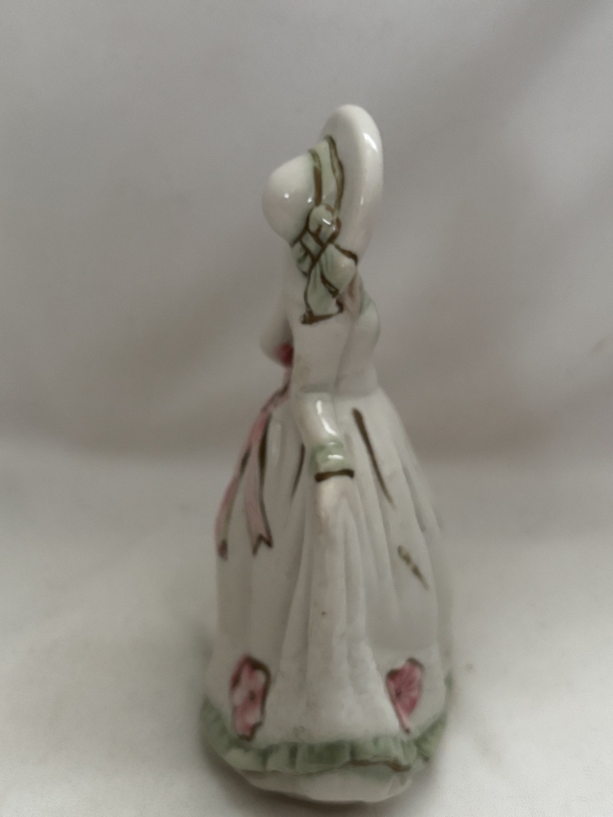 Porcelain Figurine – Woman with Hat and Pink Flowers, Pink Ribbon, Gold Accents
