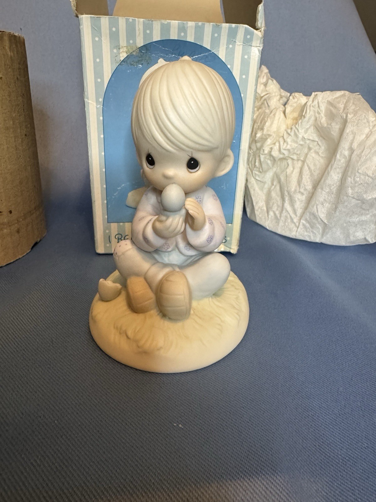 Precious Moments figurine titled “I Believe In Miracles”. New in box