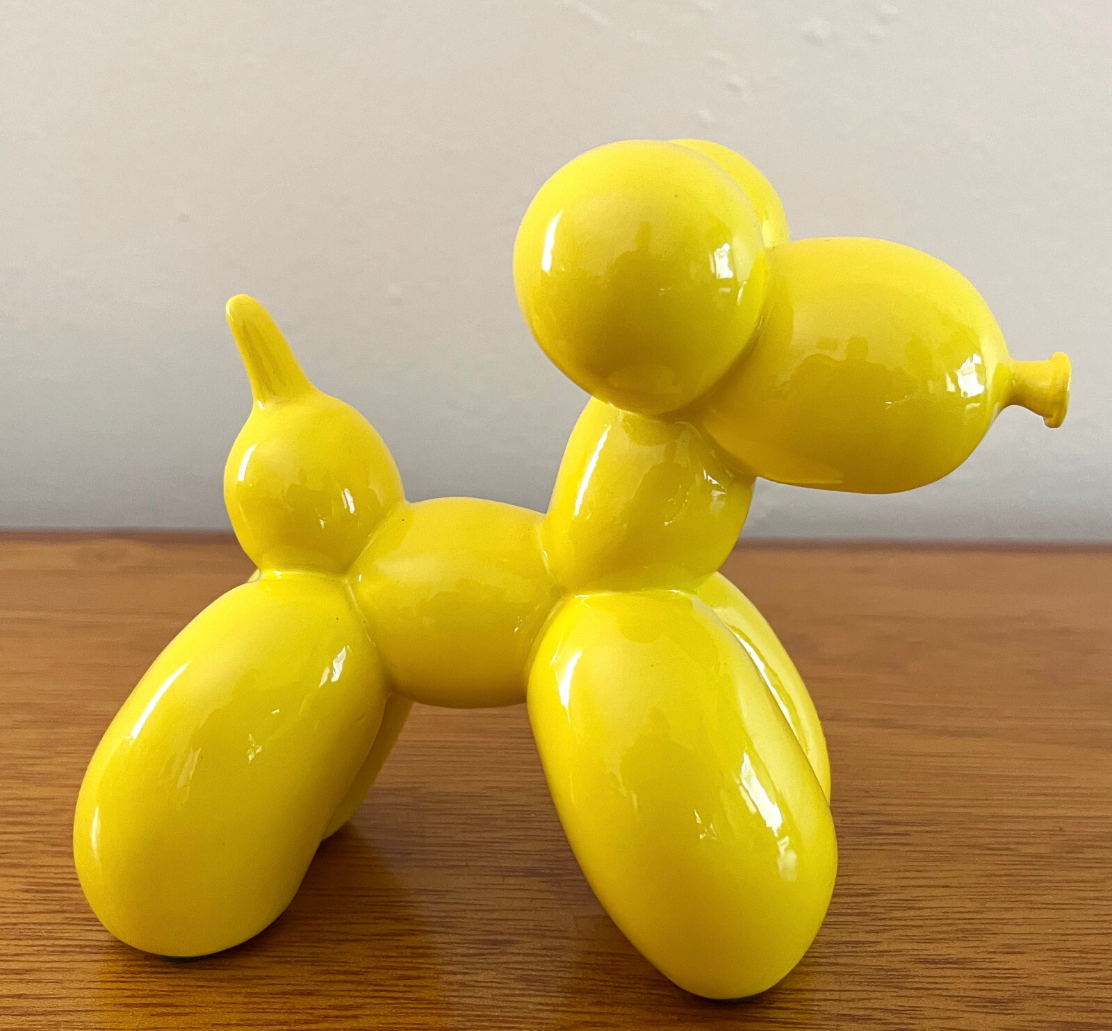 YELLOW CERAMIC RESIN BALLOON DOG FIGURINE- 4.5″ x 6″